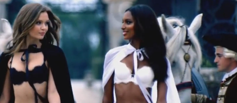 Two models in lingerie talking together from Victoria's Secret