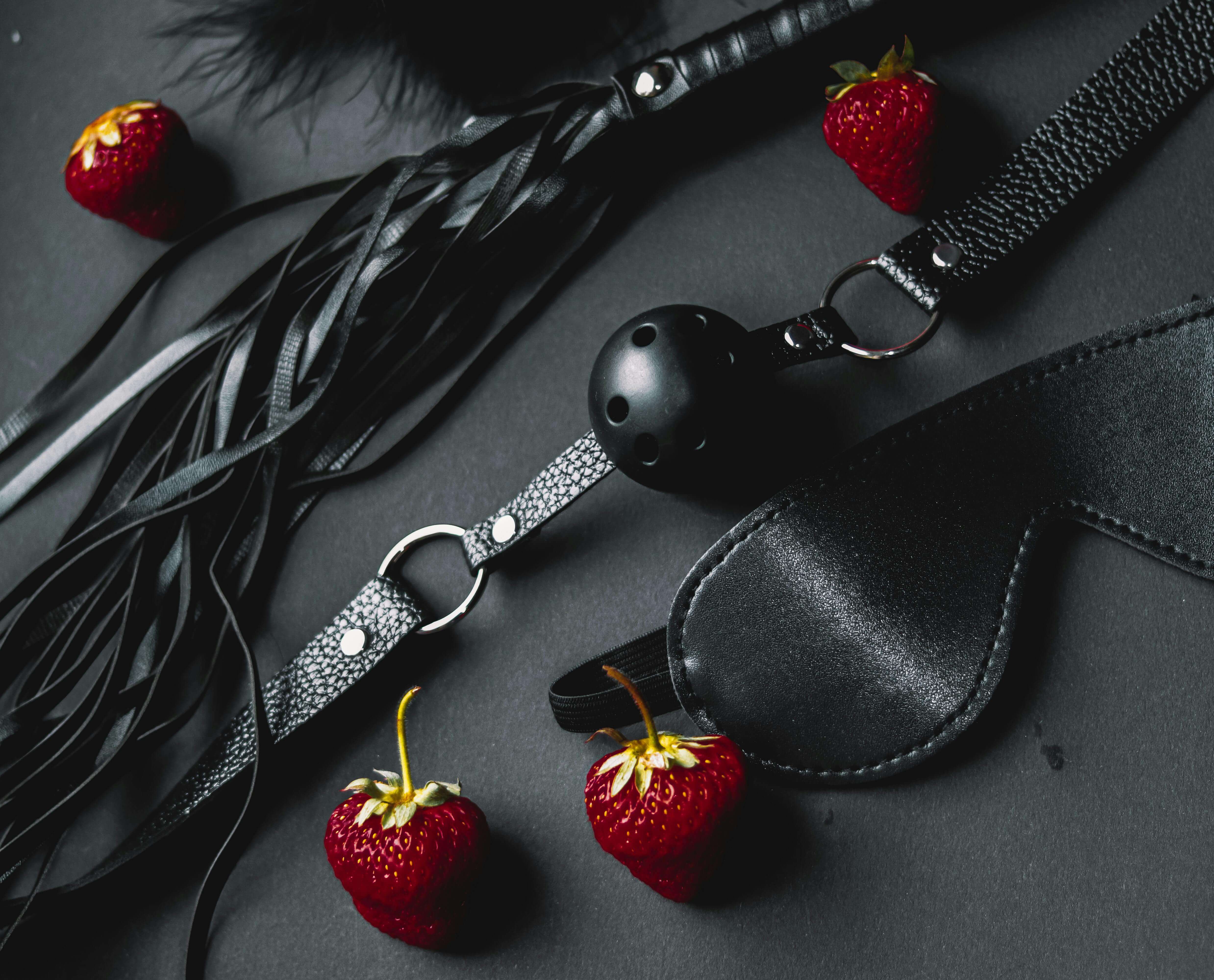 a range of equiptment that our elite dominatrix escorts use including black whips and blindfolds and ball gags.