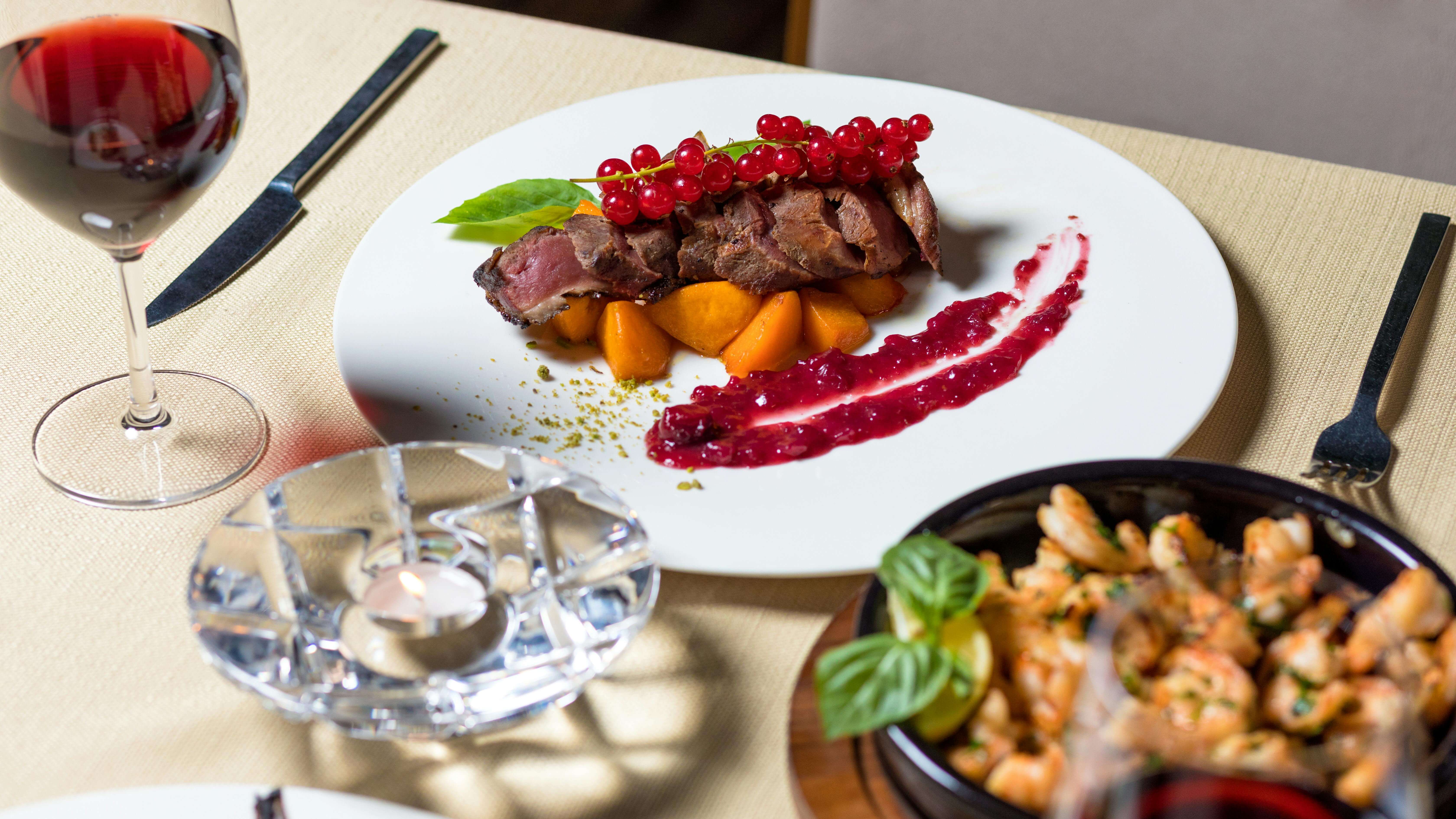 a contemporary steak dish in a trendy restaurant