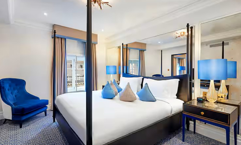 A special suite in the Waldorf with a huge four poster bed