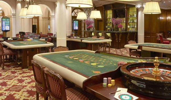 The poker tables inside Les Ambassadeurs private club